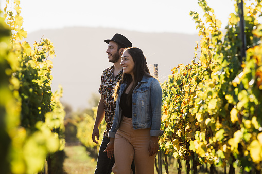 Couple visiting a vineyard in Chile