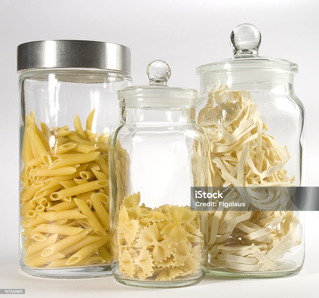 Pasta Different kinds of pasta in glass jars Bow Tie Pasta Stock Photo