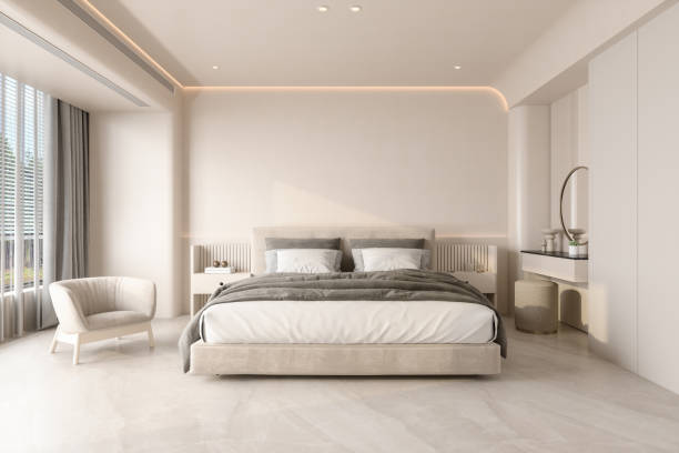nowoczesne wnętrze sypialni z podwójnym łóżkiem, fotelem i stolikami nocnymi - double bed headboard hotel room design zdjęcia i obrazy z banku zdjęć