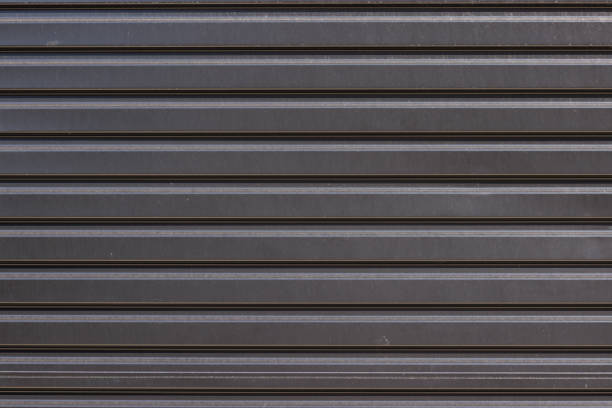 istock Close-up on a gray garage door 1472447521