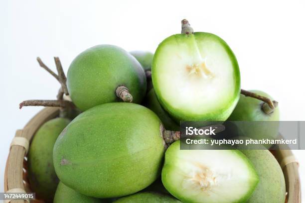 Hog Plums Or Spondias Mombin Fresh Ambarella Mombin Hog Plum Fruit On Bamboo Colander On A White Background Stock Photo - Download Image Now
