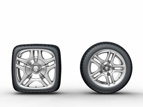 3d rendering of the round and square car wheels on white background