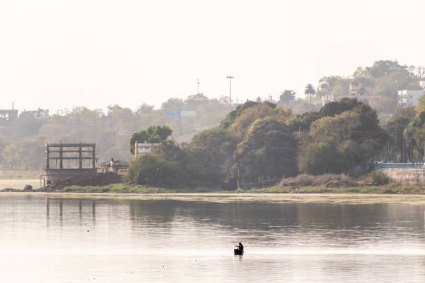 Scenic view of the Upper Lake in Bhopal. Bhopal, India - March 2019: Scenic view of the Upper Lake in the old city area of Bhopal. bhopal lake stock pictures, royalty-free photos & images