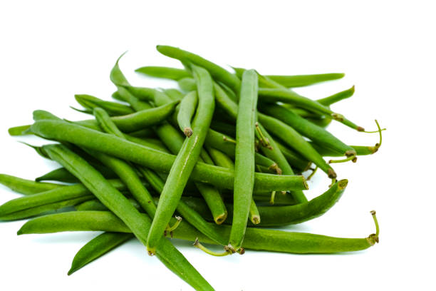 istock Fresh green beans isolated on a white background, close up view. 1472453808