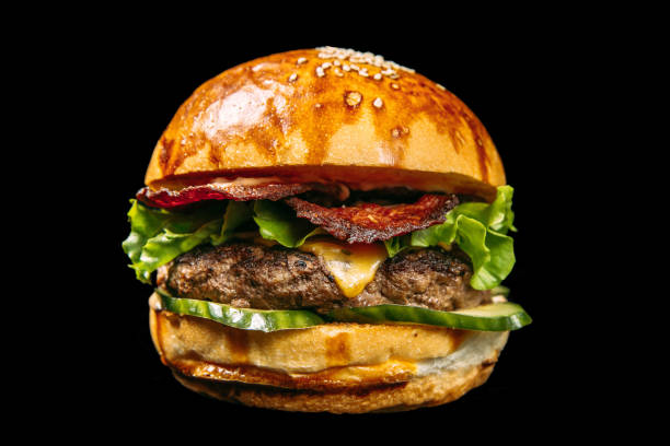 istock Isolated american burger on the black background 1472455374