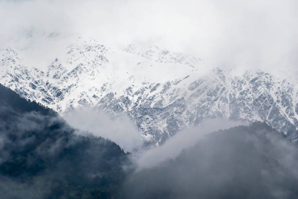 istock A snow capped Himalayan mountain covered with mist and fog 1472455390