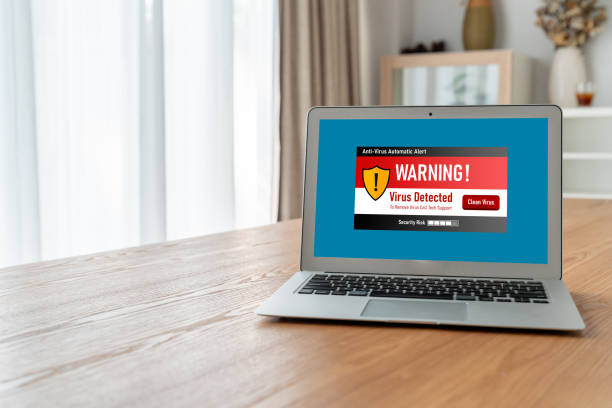 istock Virus warning alert on computer screen detected modish cyber threat 1472455682