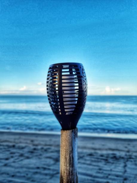 istock garden lights on the beach 1472460397