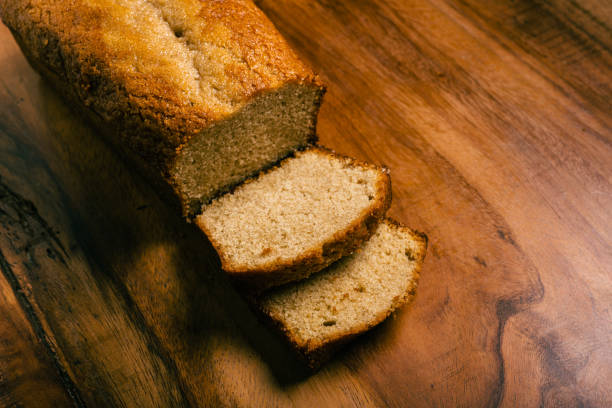 istock Homemade sponge cake on wooden table. Sliced soft pound cake. 1472460867