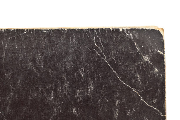 istock old black cover paper book texture background, page for design 1472462778