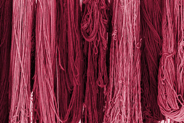 Colorful skeins of silk thread to create traditional Turkish carpet on a loom.