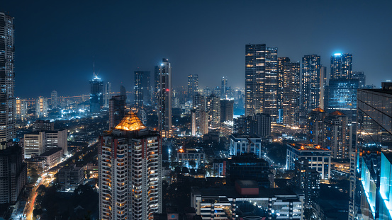 Mumbai skyline at night in Maharashtra, India. Mumbai is India's largest city and the heart of the Bollywood film industry.