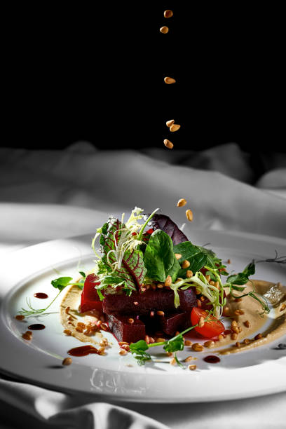 istock Beetroot and nut sauce salad sprinkled with nuts. Hard light. 1472469762