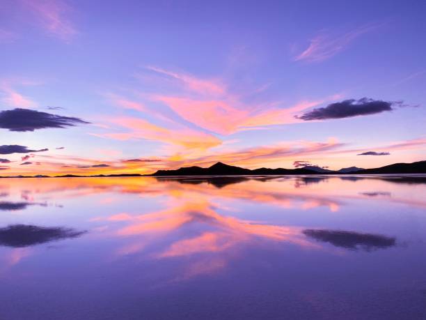 istock Dusk over lake and mountains. 1472471234