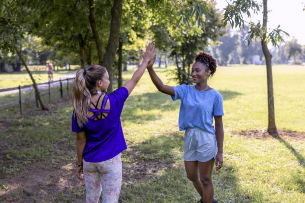 istock High-five on a break from sports 1472472644