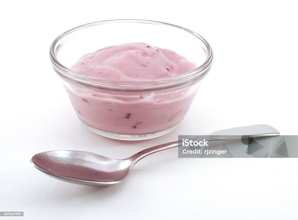 Glass bowl with fruit yogurt and spoon a glass bowl of yogurt and a spoon Blueberry Stock Photo