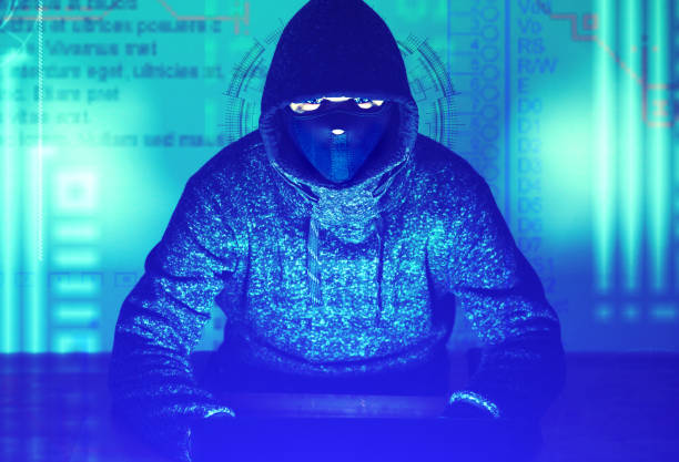 istock Man in hoodie is hacking personal data. Information security. Protection of information concept. Bad password. 1472477773
