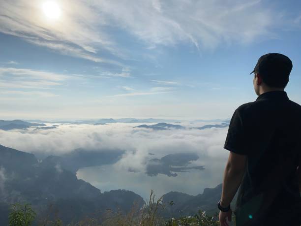 istock Mountain lake covered in mist 1472478173