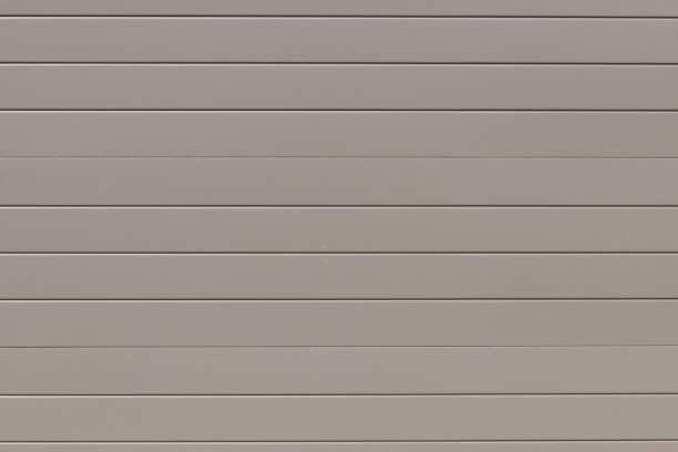 istock Beige metal garage door section 1472479243