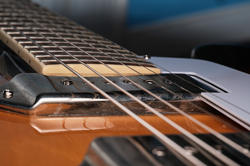 White Electric Bass Guitar Isolated on White Background