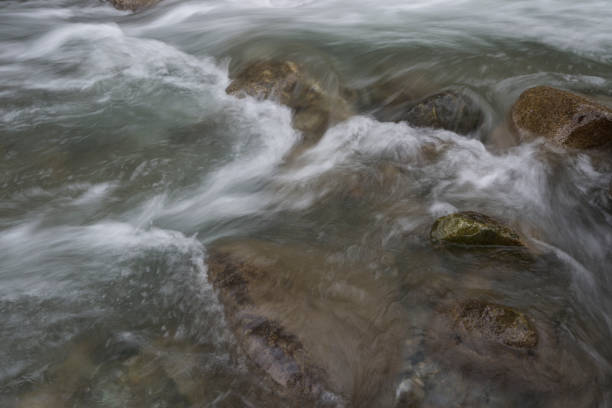 istock Clean Rocky River - Stock Photo 1472480742
