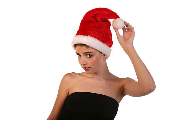 Mulher com Chapéu do Pai Natal - fotografia de stock