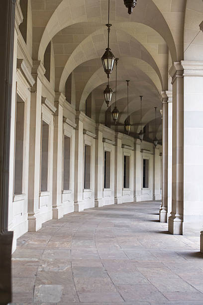istock Empty Curving Colonnade Tunnel Reagan Building, Washington, DC, USA 147248767