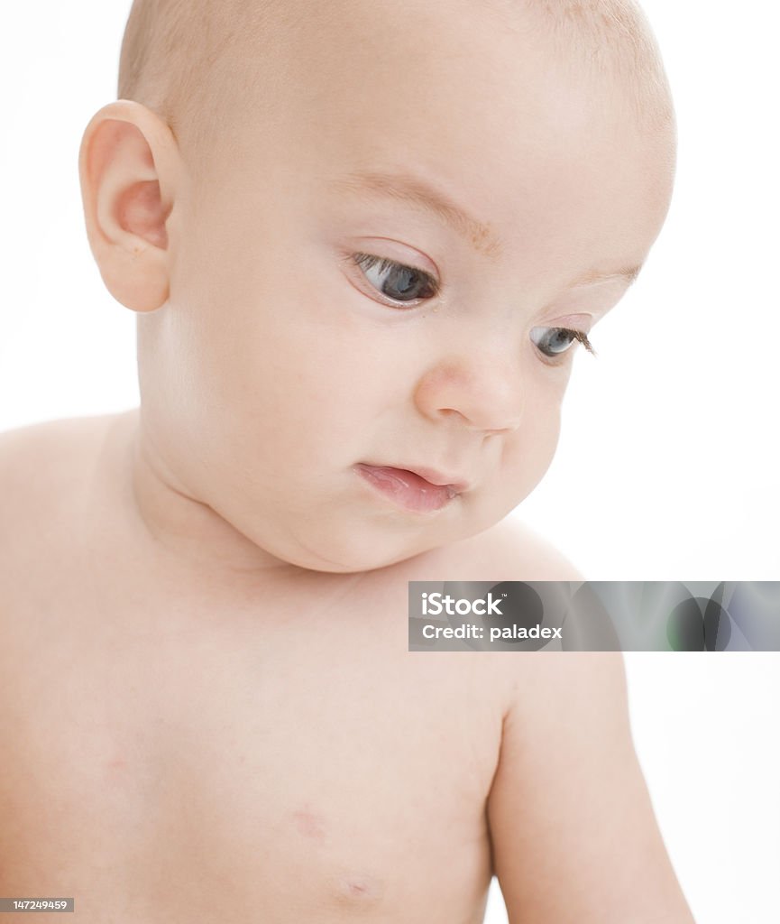 curious Baby Closeup of cute baby girl, isolated on white. 2-5 Months Stock Photo