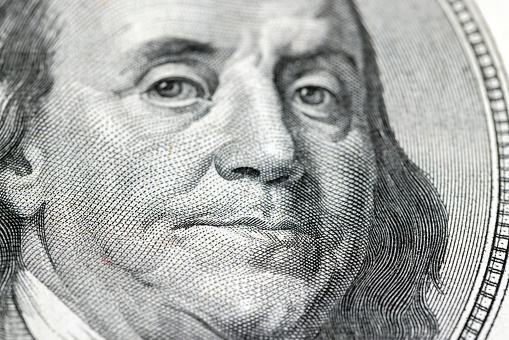 close-up of one hundred American dollars, details of 100 American dollars in cash