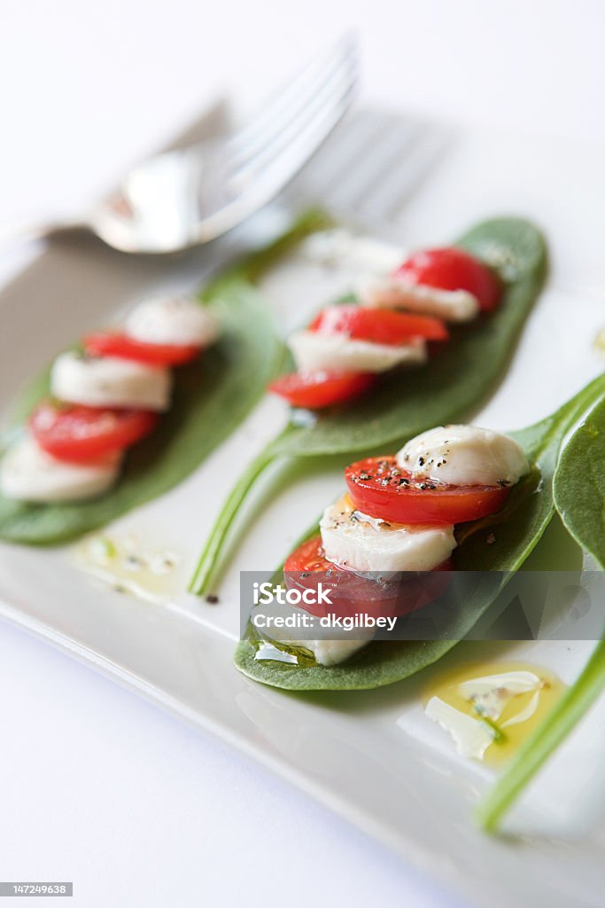Tomates, mozzarella & salade d'épinards - Photo de Aliment libre de droits