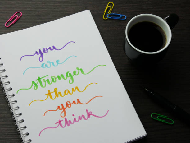 istock YOU ARE STRONGER THAN YOU THINK handwritten in notebook 1472501276