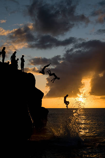 istock Jumping in Waimea Bay 147250128