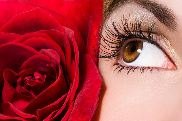 istock Woman eye and red rose 147250274