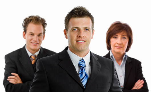 Team portrait of smiling business people, white background. Click here for more business photos:    