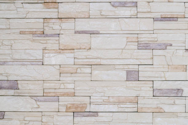 istock Cream stonewall with hirizontal pattern used for background texture in decorative art work 1472503947