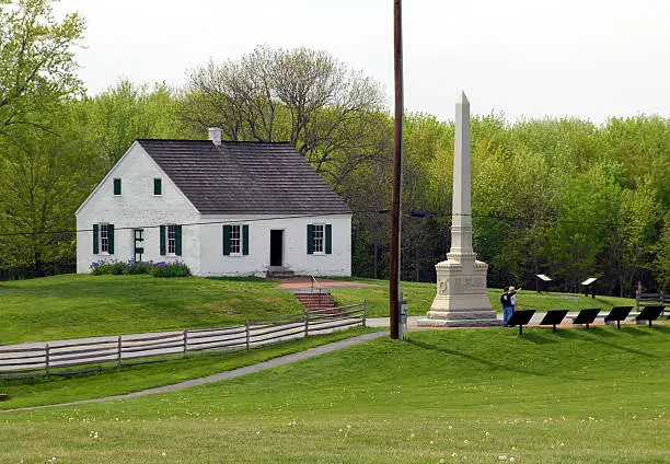 The verdant shades of spring surround the Dunker Church at Antietam National Military Park in Sharpsburg, Maryland. The Dunker Church was the scene of fierce combat during the Battle of Antietam in September 1862.