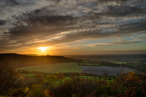 The sun sets on the Chiltern Hills, Buckinghamshire, in the South East of England.
