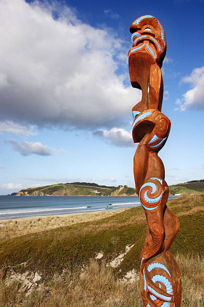 Maori carving overlooking Omaha beach stock photo