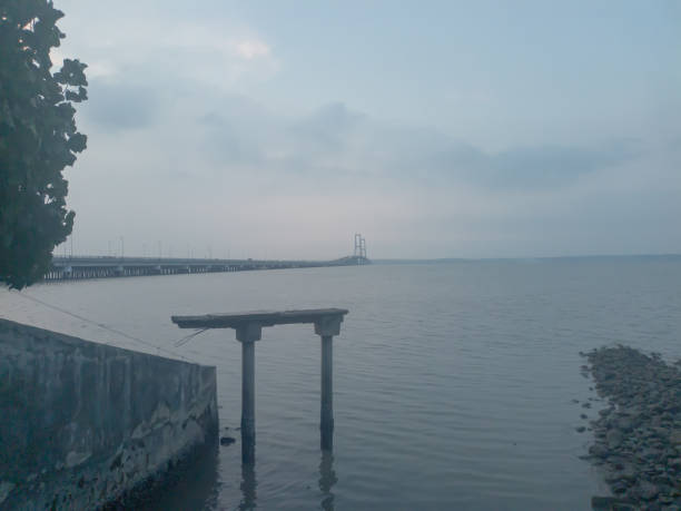 istock Beautiful sky on indonesia bridge 1472509340