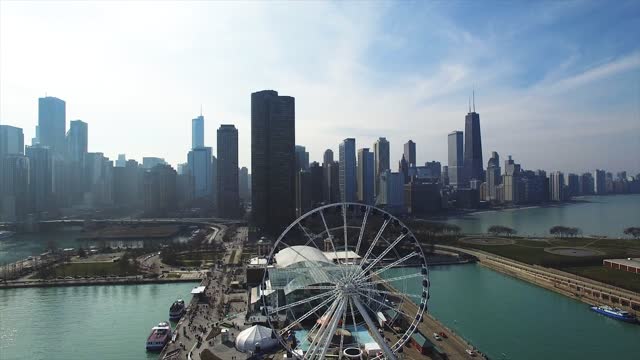 4k aerial over the Navy Pier in Chicago in a spring day
