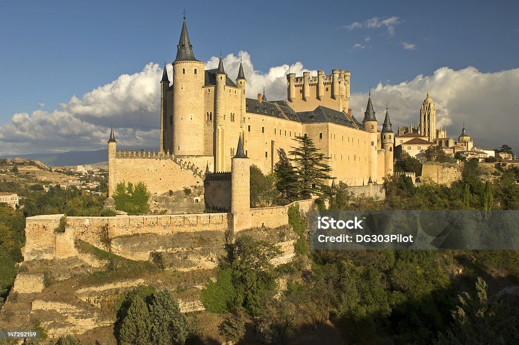 Segovia's Alcazar on a late afternoon. A view  of the Alcazar in Segovia, Spain on a late afternoon. An autumn storm is beginning to move into the area. Segovia Stock Photo