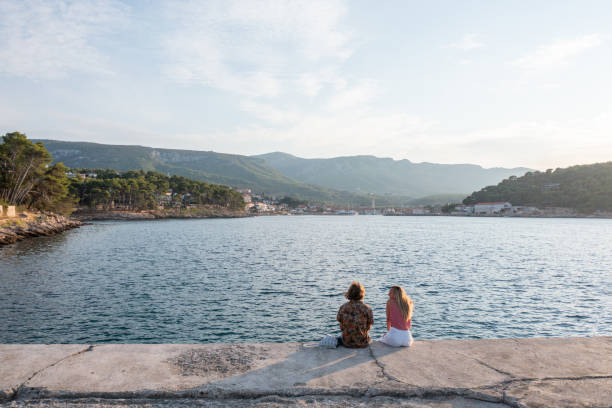 Drone view of couple watching sunset on pier Rear view of the two adults looking towards Croatian old town.
Croatia, travel in Eastern Europe concept jelsa stock pictures, royalty-free photos & images