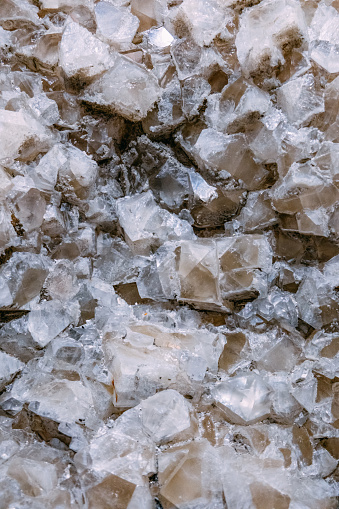 Close up of Pure Quartz Crystal Cluster on Black Background. Natural growing crystals of Clear Quartz