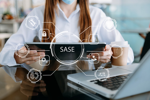 SASE Secure Access Service Edge concept Hand touching Secure Access Service Edge icon on virtual screen background, password, network, framework and support technology in modern office