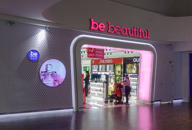 formally dressed Latina woman average age 50 with short hair is inside the store shopping for her care