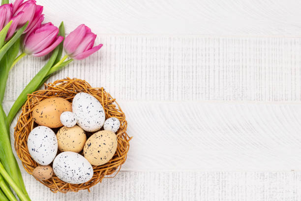 istock Fresh pink tulip flowers and easter eggs 1472526258