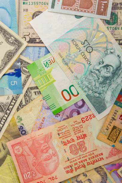 istock Background from different money banknotes from all over the world 1472526720