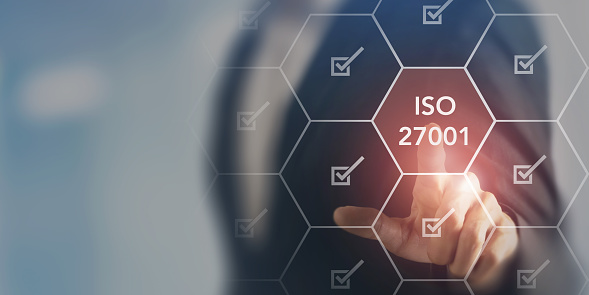 ISO 27001 concept. The international standard for information security management. Ensure the confidentiality, integrity and availability of data, systems and networks. Mitigate cyber-attacks risk.