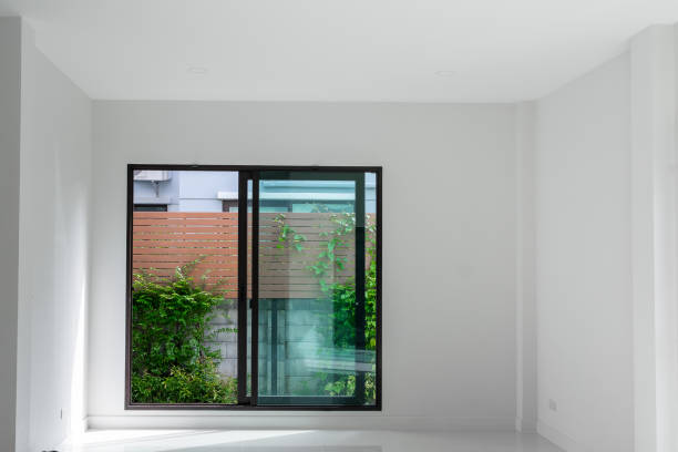 istock Sliding black stainless steel glass doors inside the house. 1472528382