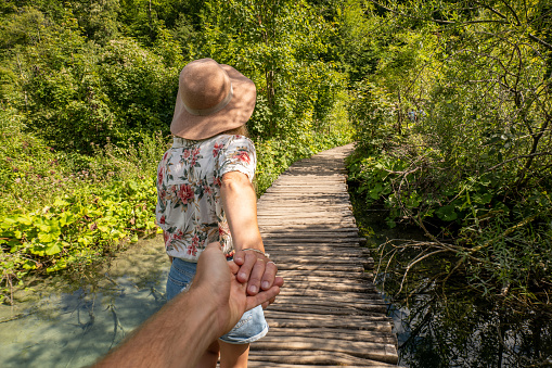https://media.istockphoto.com/id/1472531065/photo/oung-couple-holding-hands-follow-me-to.jpg?b=1&s=170667a&w=0&k=20&c=AjomMyF-PS-_Q-8Ckd_fSOcN8xTTNwr1D9HZLWEfq6k=